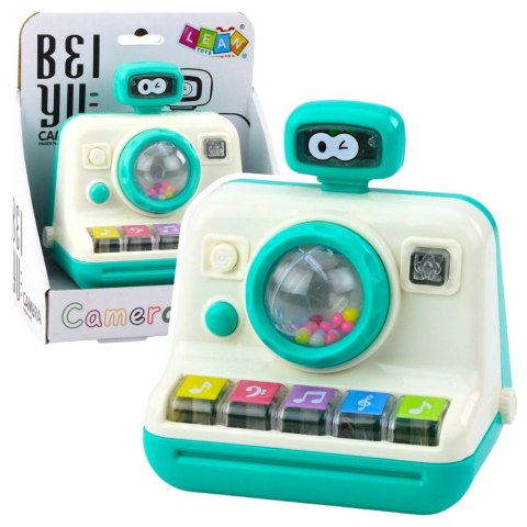 Interaktywny Aparat Pianinko Grzechotka Światła Dźwięki Biało Zielony LEAN Toys Interaktywny Aparat Pianinko Grzechotka Światła Dźwięki Biało Zielony LEAN Toys