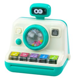 Interaktywny Aparat Pianinko Grzechotka Światła Dźwięki Biało Zielony LEAN Toys